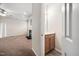 This cozy space seamlessly connects to a half bathroom and living room with fireplace at 4038 Patriot Ridge Ct, Raleigh, NC 27610