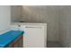 Modern bathroom with gray tiled shower featuring a built in shower bench at 50 Rainfall Dr, Pittsboro, NC 27312