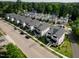 Aerial view of a new construction neighborhood offering a blend of modern living and natural surroundings at 5057 Lundy Dr # 101, Raleigh, NC 27606