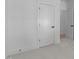 Bright, neutral hallway leads to a bedroom, emphasizing simplicity and functionality at 5057 Lundy Dr # 101, Raleigh, NC 27606