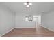 Bright, spacious living room with hard surface flooring and ample natural light at 5210 Blue Lagoon Ln, Raleigh, NC 27610