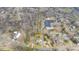 An aerial view showing the approximate lot lines of a property near a neighborhood at 603 W Main St, Haw River, NC 27258