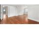Bright bedroom features hardwood floors, closet, and a window at 603 W Main St, Haw River, NC 27258