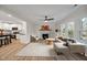 Bright living room features fireplace, hardwood floors, and abundant natural light, creating a cozy and inviting atmosphere at 605 Canterbury Rd, Sanford, NC 27330