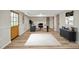 Spacious home office with desk, chair, black storage cabinet, and neutral decor at 605 Canterbury Rd, Sanford, NC 27330