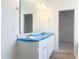 Bathroom features a white vanity with a large mirror and modern fixtures at 63 Tee Time Ter, Benson, NC 27504