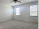 Clean bedroom featuring plush carpet, neutral walls, and natural light from windows at 63 Tee Time Ter, Benson, NC 27504