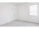 Bedroom with carpet, white walls, window, and closet at 63 Tee Time Ter, Benson, NC 27504