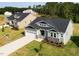 Charming one-story home with a two-car garage and new construction in a desirable neighborhood at 63 Tee Time Ter, Benson, NC 27504