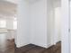 View of the open hallway leading to kitchen and living area at 63 Tee Time Ter, Benson, NC 27504