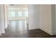 Bright and airy living room with hardwood floors and an abundance of natural light at 63 Tee Time Ter, Benson, NC 27504