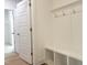 A well-organized mudroom features built-in bench seating, cubbies, and coat hooks for easy storage at 63 Tee Time Ter, Benson, NC 27504
