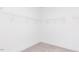 Walk-in closet with shelves and carpet flooring at 63 Tee Time Ter, Benson, NC 27504