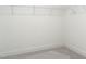 Walk-in closet with white wire shelving, providing ample storage space at 63 Tee Time Ter, Benson, NC 27504