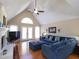 Living room features a fireplace and French doors to the outside at 703 E Stanley St, Four Oaks, NC 27524