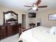 Stylish main bedroom featuring a ceiling fan and decorative furnishings at 703 E Stanley St, Four Oaks, NC 27524