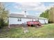 View of backyard, deck and rear exterior of home at 7329 Blannie Farms, Willow Springs, NC 27592