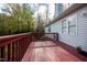 A spacious, stained deck overlooks the expansive backyard at 7329 Blannie Farms, Willow Springs, NC 27592