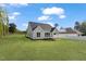 Charming single-Gathering home with well-maintained lawn and a modern architectural design at 8487 Old Us 421, Lillington, NC 27546