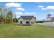 Beautifully landscaped single-Gathering home with modern design and spacious front yard at 8487 Old Us 421, Lillington, NC 27546