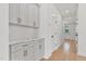 Pantry features marble counters, tile backsplash, and generous cabinet storage at 8487 Old Us 421, Lillington, NC 27546