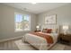 Cozy bedroom featuring neutral colors, a comfortable bed, and bright natural light at 934 Woodland Rd, Creedmoor, NC 27522