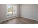 Inviting bedroom with natural light and scenic outdoor views at 934 Woodland Rd, Creedmoor, NC 27522