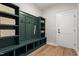 Organized mudroom with built-in storage solutions for shoes, coats, and accessories at 934 Woodland Rd, Creedmoor, NC 27522