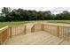 New wood back deck is ready for entertaining while enjoying your yard at 9600 Stallings Rd, Spring Hope, NC 27882