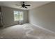 Bedroom featuring a ceiling fan and a window at 9600 Stallings Rd, Spring Hope, NC 27882