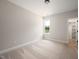 Neutral bedroom with carpet and walk-in closet at 9600 Stallings Rd, Spring Hope, NC 27882