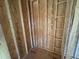 Interior view of closet framing, showing stud walls and subfloor at 9600 Stallings Rd, Spring Hope, NC 27882