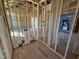A view of the interior framing showcasing the layout and structural elements of the home under construction at 9600 Stallings Rd, Spring Hope, NC 27882