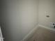 The unfinished laundry room has connections, neutral paint, and white trim at 9600 Stallings Rd, Spring Hope, NC 27882