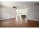 Spacious open-concept living room showcasing hardwood floors connecting the kitchen and living space at 9600 Stallings Rd, Spring Hope, NC 27882