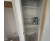 A shot of the inside of the white shelved pantry at 9600 Stallings Rd, Spring Hope, NC 27882