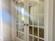 Bright entryway features beautiful French doors that lead to a sunroom with hardwood floors at 98 Tee Time Ter, Benson, NC 27504
