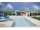 A rendering of the community pool area with a slide, modern buildings, and ample lounge space at 101 Parkland Dr, Pittsboro, NC 27312
