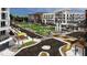 A bustling outdoor community space shows green lawns and inviting spots for people to gather at 101 Parkland Dr, Pittsboro, NC 27312