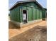 A new construction shows its exterior with modern siding, set on a concrete foundation and exposed soil at 101 Parkland Dr, Pittsboro, NC 27312