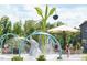 Community splash pad featuring elephant fountain and playful water features, perfect for Gathering fun on a sunny day at 101 Parkland Dr, Pittsboro, NC 27312