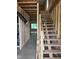 Unfinished wooden stairway showcasing the home's construction and potential for customization at 101 Parkland Dr, Pittsboro, NC 27312