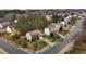 Aerial view showcasing the home's location, landscaping, and surrounding neighborhood at 1046 Upchurch Farm Ln, Cary, NC 27519