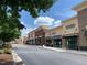 Exterior shot of commercial stores with storefronts and parking spots at 1046 Upchurch Farm Ln, Cary, NC 27519