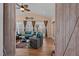 Bright sunroom with wicker furniture, ceiling fan, and large windows for natural light at 1046 Upchurch Farm Ln, Cary, NC 27519