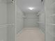 Walk-in closet is equipped with ample shelving and storage, providing a well-organized space at 1046 Upchurch Farm Ln, Cary, NC 27519