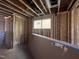 Unfinished basement with exposed framing and utility lines visible at 107 Parkland Dr, Pittsboro, NC 27312