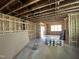 Unfinished basement ready for customization with exposed beams and rough electric at 107 Parkland Dr, Pittsboro, NC 27312