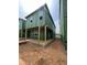 Exterior of a new two-story home with a covered porch and visible ZIP System sheathing, ready for finishes at 107 Parkland Dr, Pittsboro, NC 27312