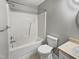 Bathroom featuring shower and tub, modern fixtures and vanity at 108 New Castle Ct, Youngsville, NC 27596